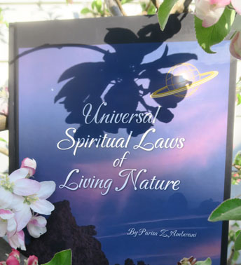 Book called Universal Spiritual Laws of Living Nature by Parisa Z. Ambwani